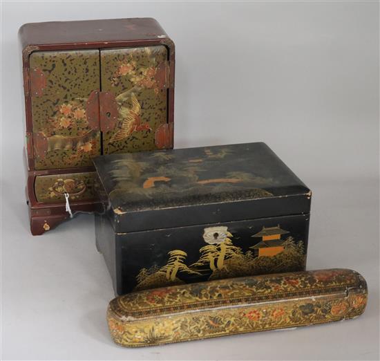 A Kashmiri pen box, a Japanese lacquered table cabinet and a similar music box